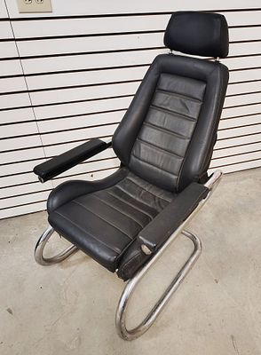 sports car seat. Adjustable sports car bucket seat custom made for a 1960s-1970s speed shop. 