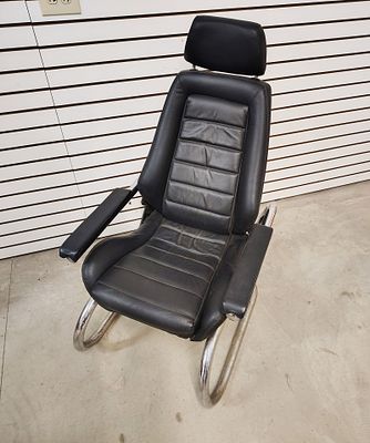 Sports car seat. Adjustable sports car bucket seat custom made for a 1960s-1970s speed shop. 