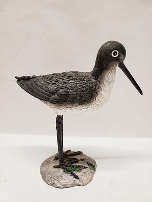 Water Bird Figurine. has a cracked leg, it is just in the outside coating it still stands up - 