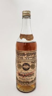 פרידמן תנובה – סופריור ברנדי | Superior Brandy בקבוק סגור - שנות ה-50. בקבוק ברנדי ישראלי מוקדם 
