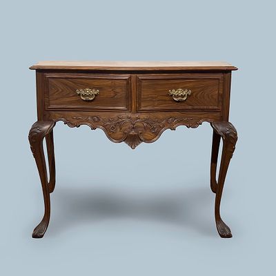 Mesa de encostar D. Jos&eacute; (1750-1777) pau-santo com entalhamentos, saiais recortados, entalhados 