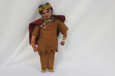 A Vintage Native American Jointed Doll. 7 3/4" tall