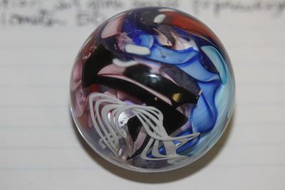 Small Art Glass Paperweight. 1 7/8" in diameter