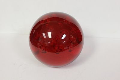 A Red Bubble Glass Weight. 4" in diameter