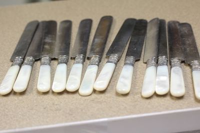 Set of 12 Sterling Band Butter Knives. well carved - mother of pearl - Wyeths cutlery - each 