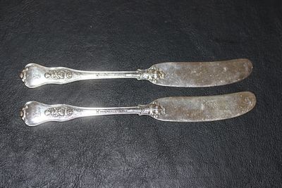 Pair of Tiffany and Company Butter Knives. well carved monograms - each 6" long