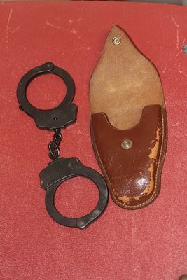 Peerless Handcuff with Leather Pouch. please note: no key