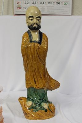 A Large Chinese Pottery Figurine. 18 3/4" tall - marked "Hongkong"