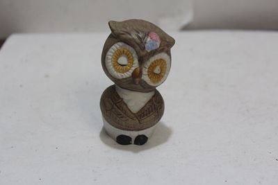 A Single Ceramic Owl Shaker. 2 1/2" tall