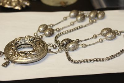 A Chinese/Asian Necklace. missing one charm as shown