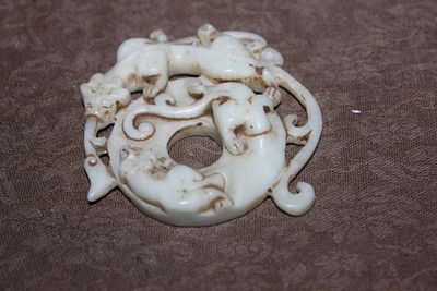 Jade Circular Disc. 2 3/8" in diameter.