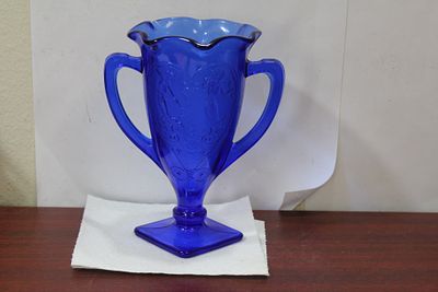 A Cobalt Blue Glass Cup. 7" tall