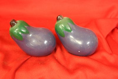 Set of Two Salt and Pepper Shakers. 3" across