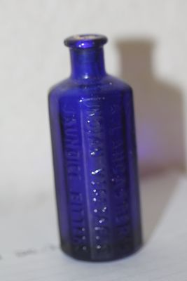 Miniture Blue Glass Bottle. 3 inches tall