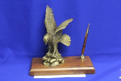 A Solid Bronze or Brass Eagle Pen Holder. please note: pen doesn't write - 7 1/8" across