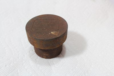 A Heavy Cast Iron Stamp of Weight. 2 1/2" in diameter
