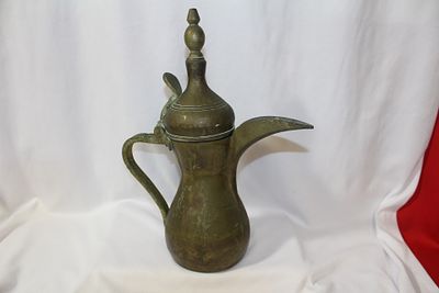 A Metal Pitcher. Probably Indian - 11 3/4" tall