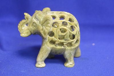 Oriental Stone Elephant. Peticulated with baby inside - 3 3/8" across