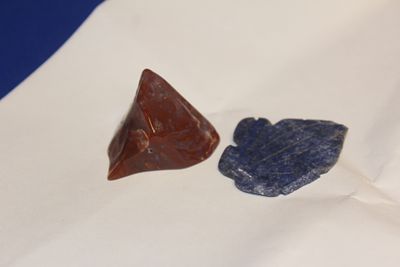 Lot of 2 Stones. one is lapis lazuli, the other one most likely blood stone