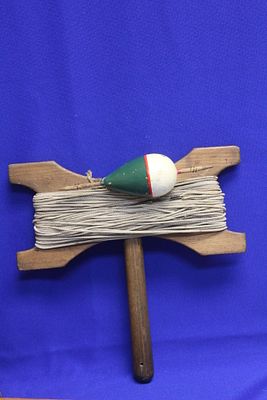 A Vintage Wooden Rope Fishing Reel. with lure? - 9 3/4" across