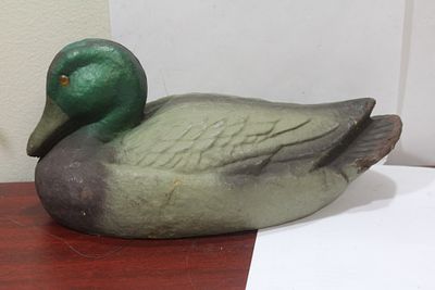A Carry Lite Duck Decoy. 13" across