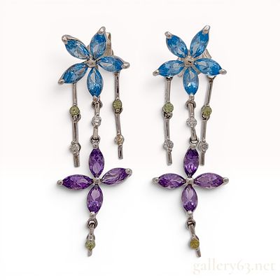 A Pair of 18K White Gold Multi-Gemstone Articulated Drop Earrings. A matched pair of articulated 
