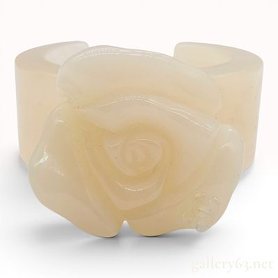 Chanel Spring 2002 Camellia Resin Cuff Bracelet. A vintage Chanel cuff bracelet constructed from 