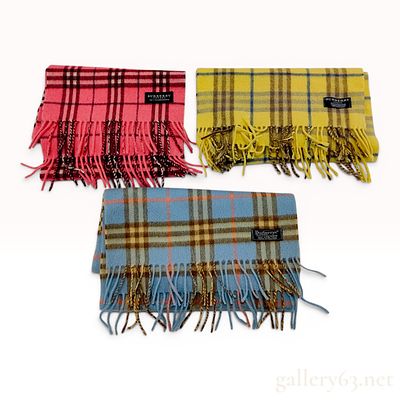 Three Burberry and Burberrys Check Cashmere Scarves. This lot includes three authentic Burberry 