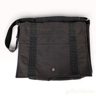 Hermes Herline Gray Canvas Messenger Bag. A messenger bag from the Hermes Herline collection 