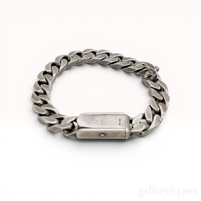 Gucci Sterling Silver Heavy Curb Link Bracelet. A heavy curb link bracelet by Gucci crafted in 