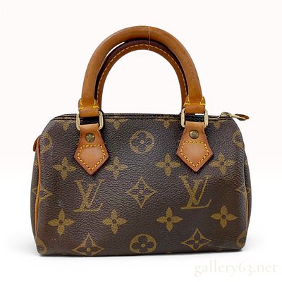 Louis Vuitton Monogram Canvas Mini Speedy Handbag. A Louis Vuitton Mini Speedy handbag, also 