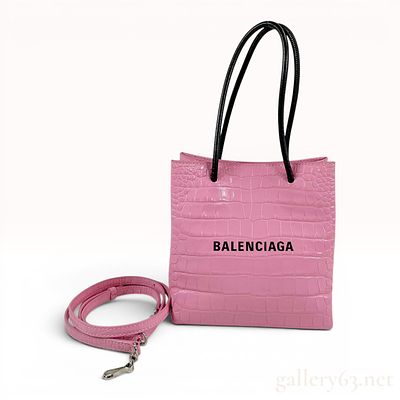Balenciaga Shopping Tote XXS in Pink Croc-Embossed Leather. This Balenciaga Shopping Tote XXS is 