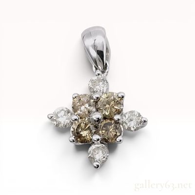 18K White Gold and 1.00ctw Diamond Cluster Pendant. This 18 karat white gold pendant features a 