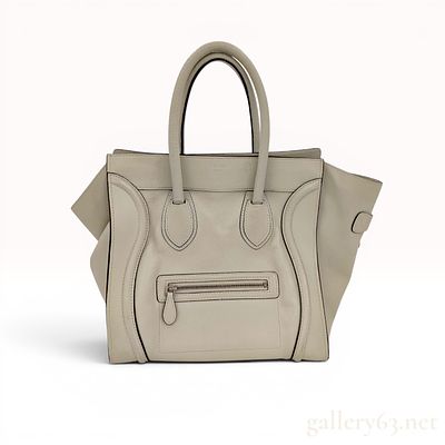 Celine Drummed Calfskin Mini Luggage Tote. This Celine Mini Luggage tote is constructed from 