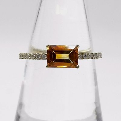 18K Yellow Gold Emerald Cut Citrine and Diamond Ring. Modern fashion ring featuring a central 