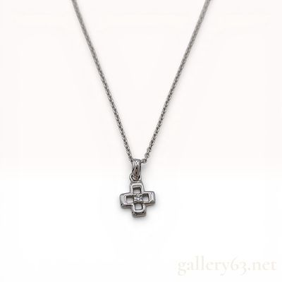 Sterling Silver and Diamond Stylized Cross Pendant Necklace. Sterling silver and diamond pendant 