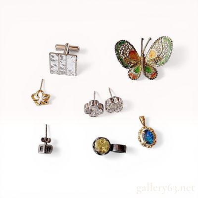 An Assortment of Vintage Costume Jewelry and Accessories Including 800 Silver and Swank. Assortme 