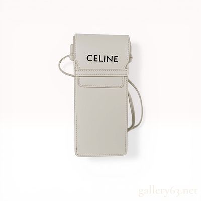 Celine Smooth Calfskin Flap Phone Pouch with Strap. Celine vertical flap phone pouch in 