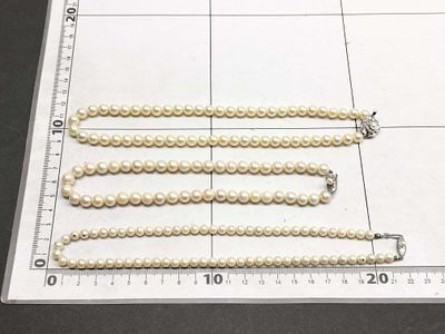 Two Genuine Cultured Pearl Necklaces with Silver Clasps and One Pearl Simulant Strand with 