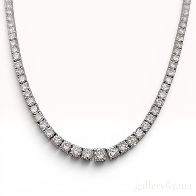 18K White Gold and 12.80 Carat Graduated Natural Diamond Riviera Necklace. A graduated diamond 