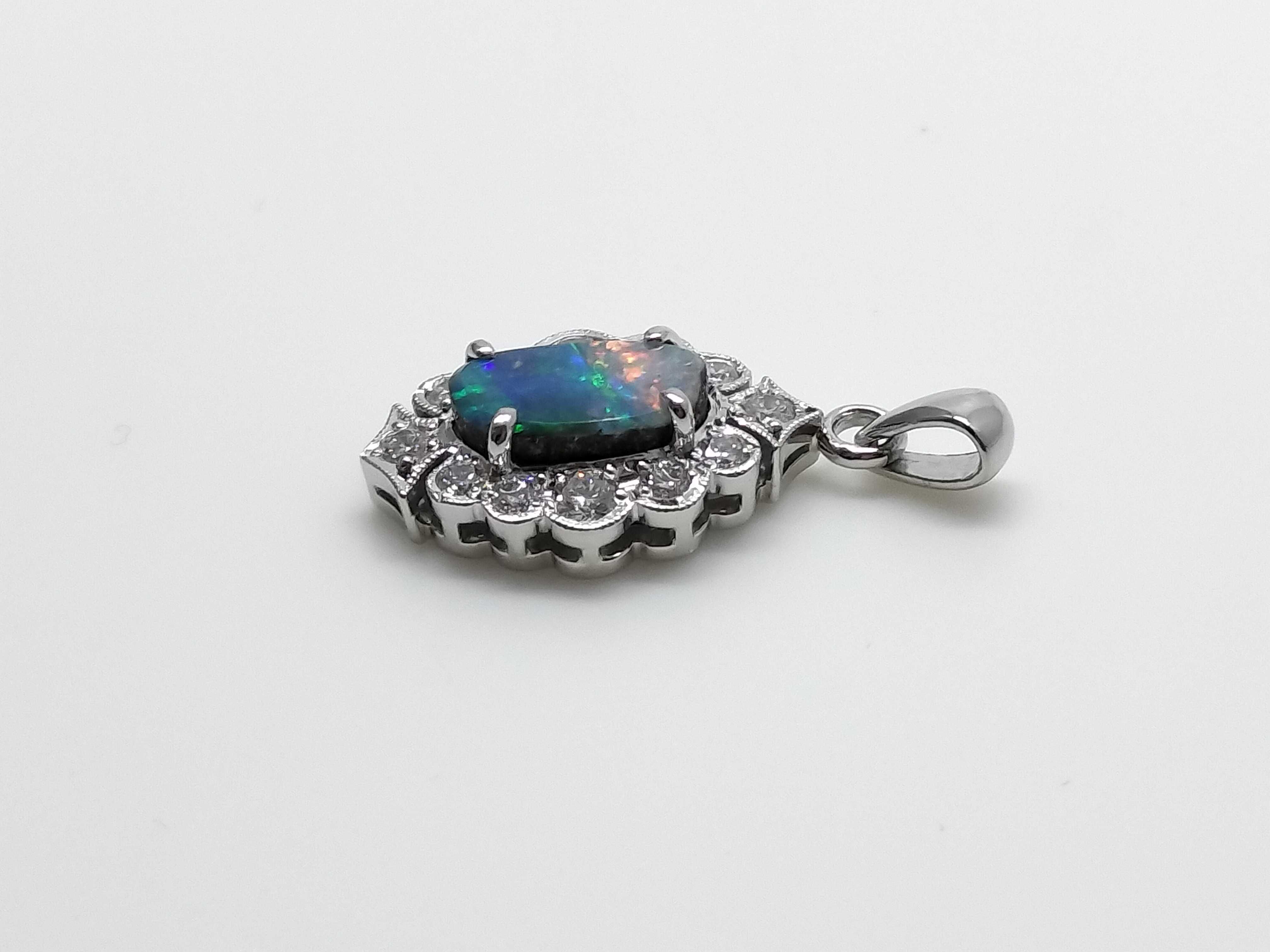 Platinum Natural Boulder Opal and Diamond Halo Pendant