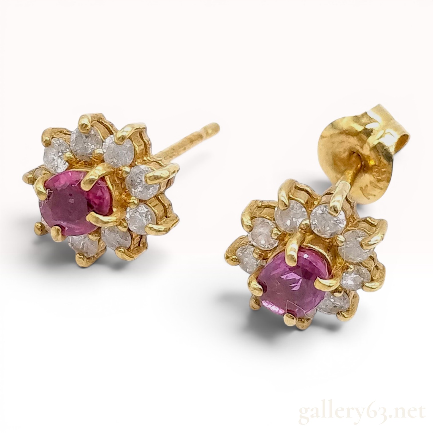 A Pair of 18K Yellow Gold Ruby and Diamond Floral Cluster Stud Earrings