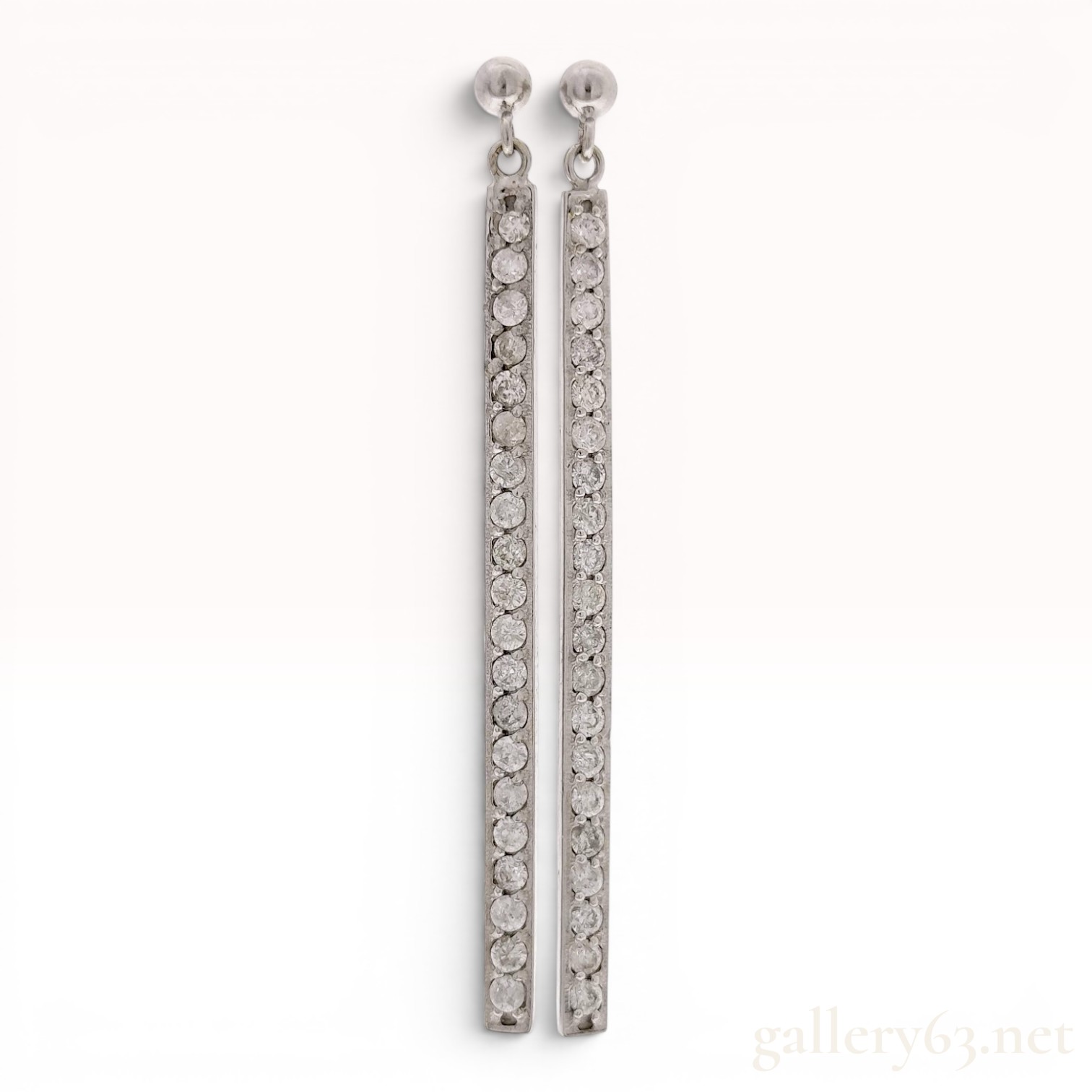 A Pair of Diamond and 18-Karat White Gold Linear Bar Drop Earrings