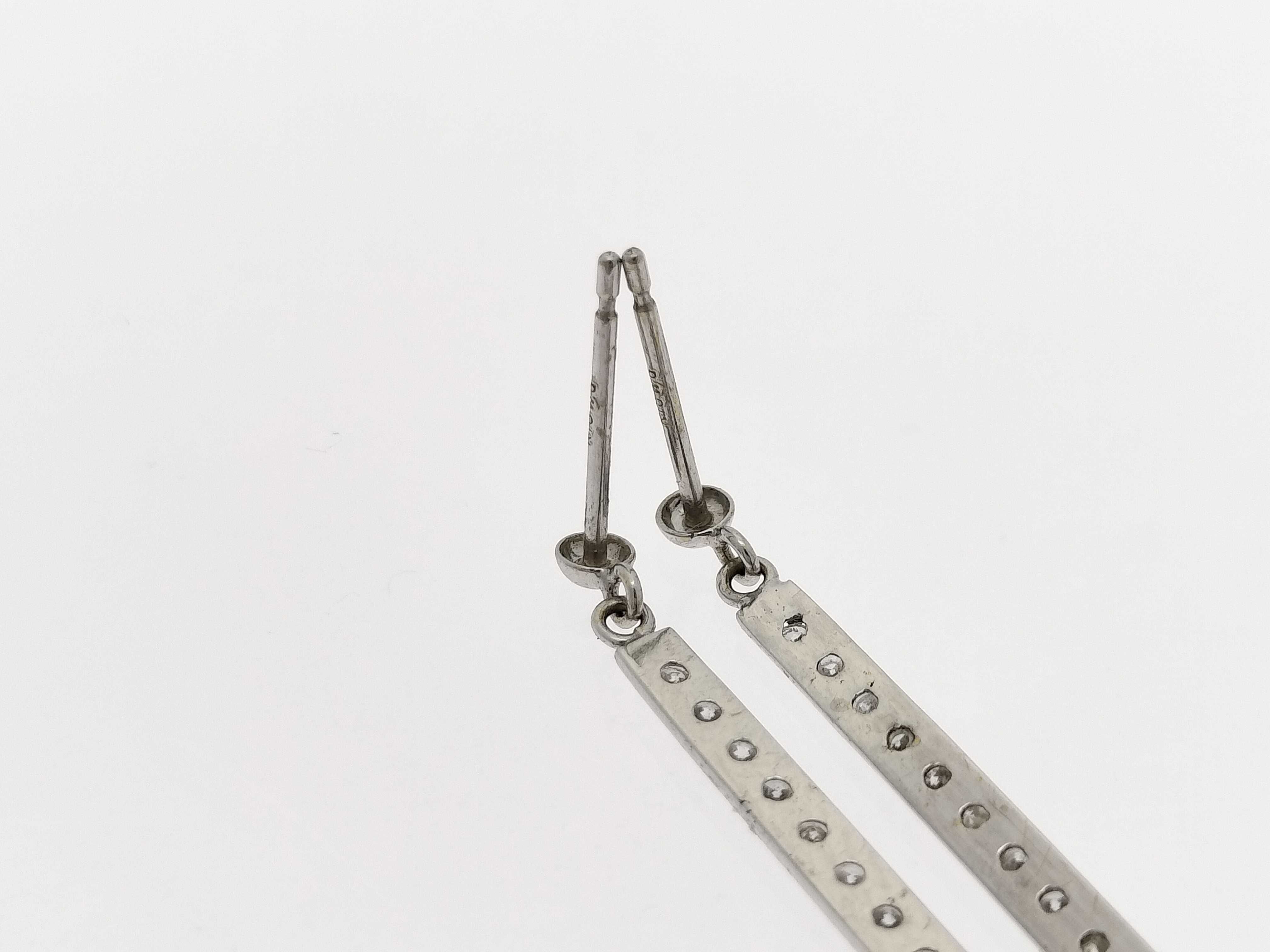 A Pair of Diamond and 18-Karat White Gold Linear Bar Drop Earrings