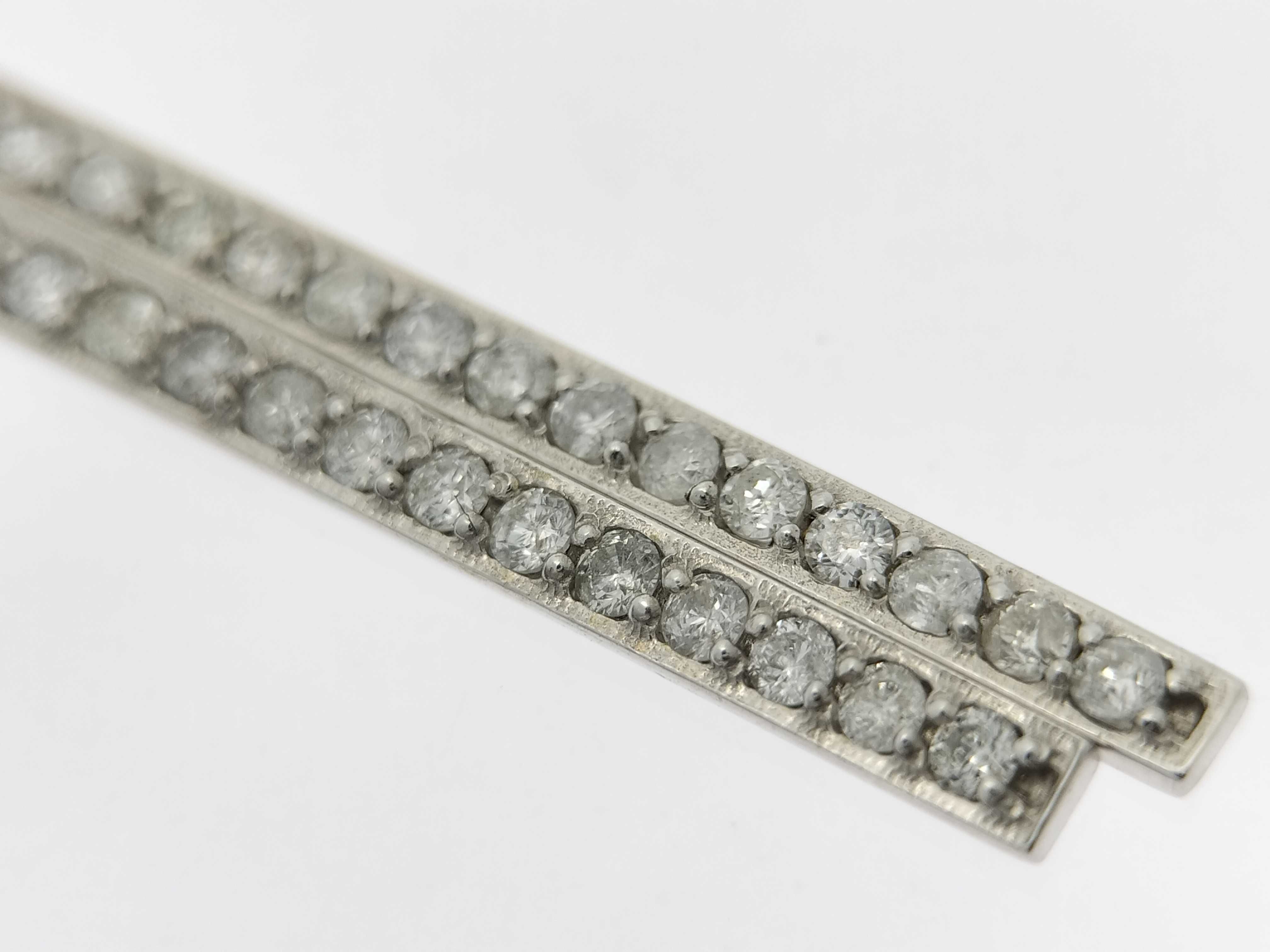 A Pair of Diamond and 18-Karat White Gold Linear Bar Drop Earrings