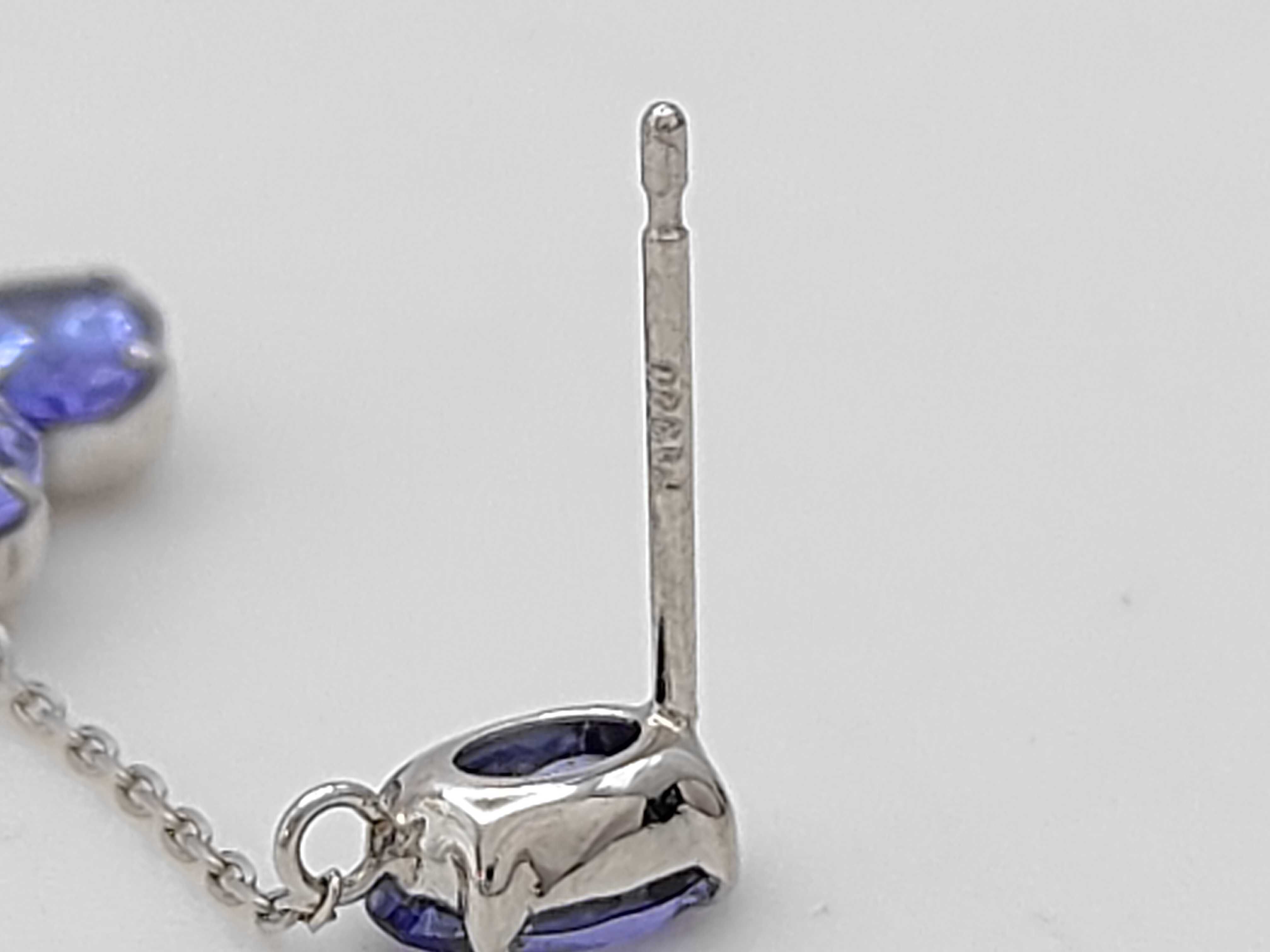 A Pair of Tanzanite and PT900 Platinum Dangle Earrings