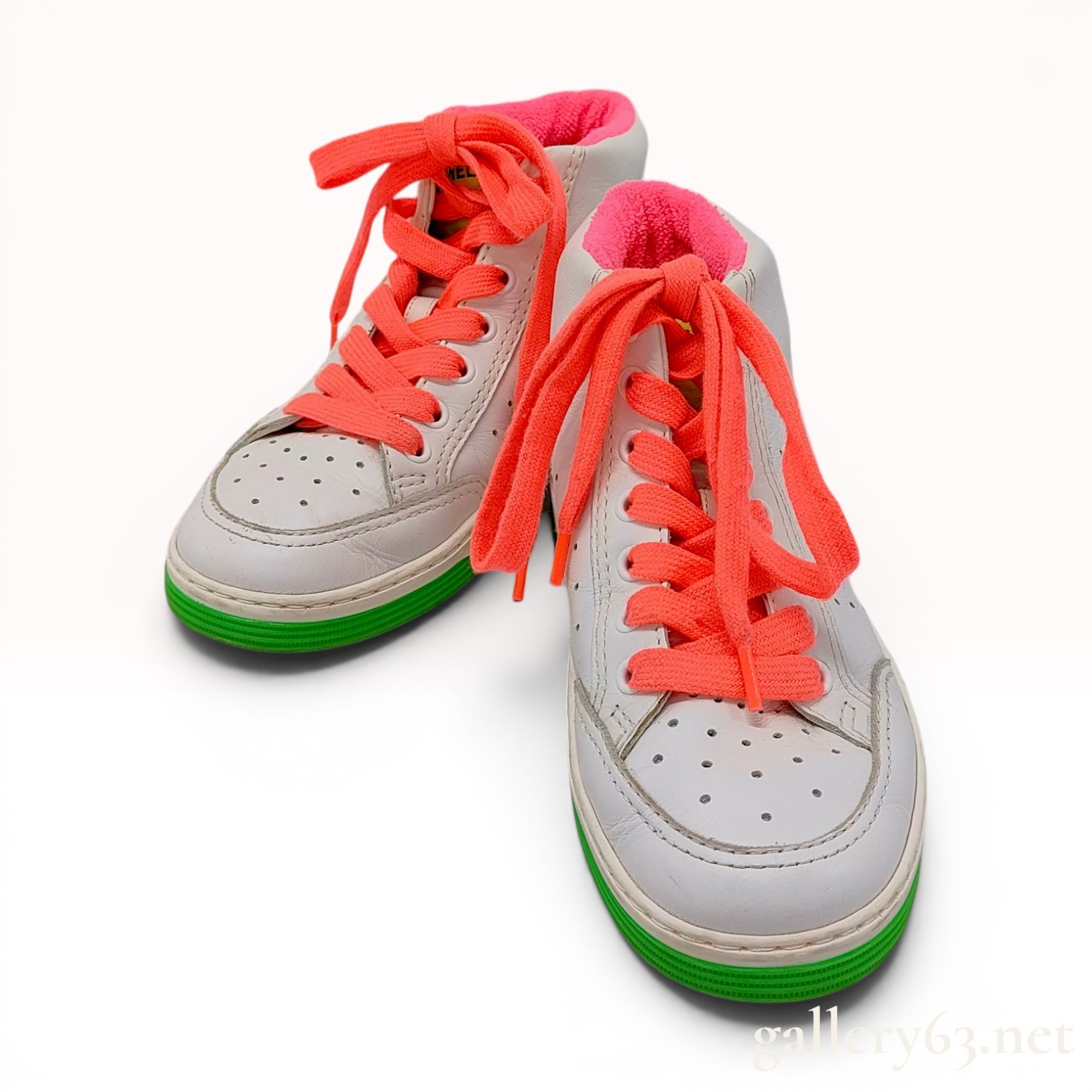 A Pair of Chanel Multicolor Leather High-Top Sneakers