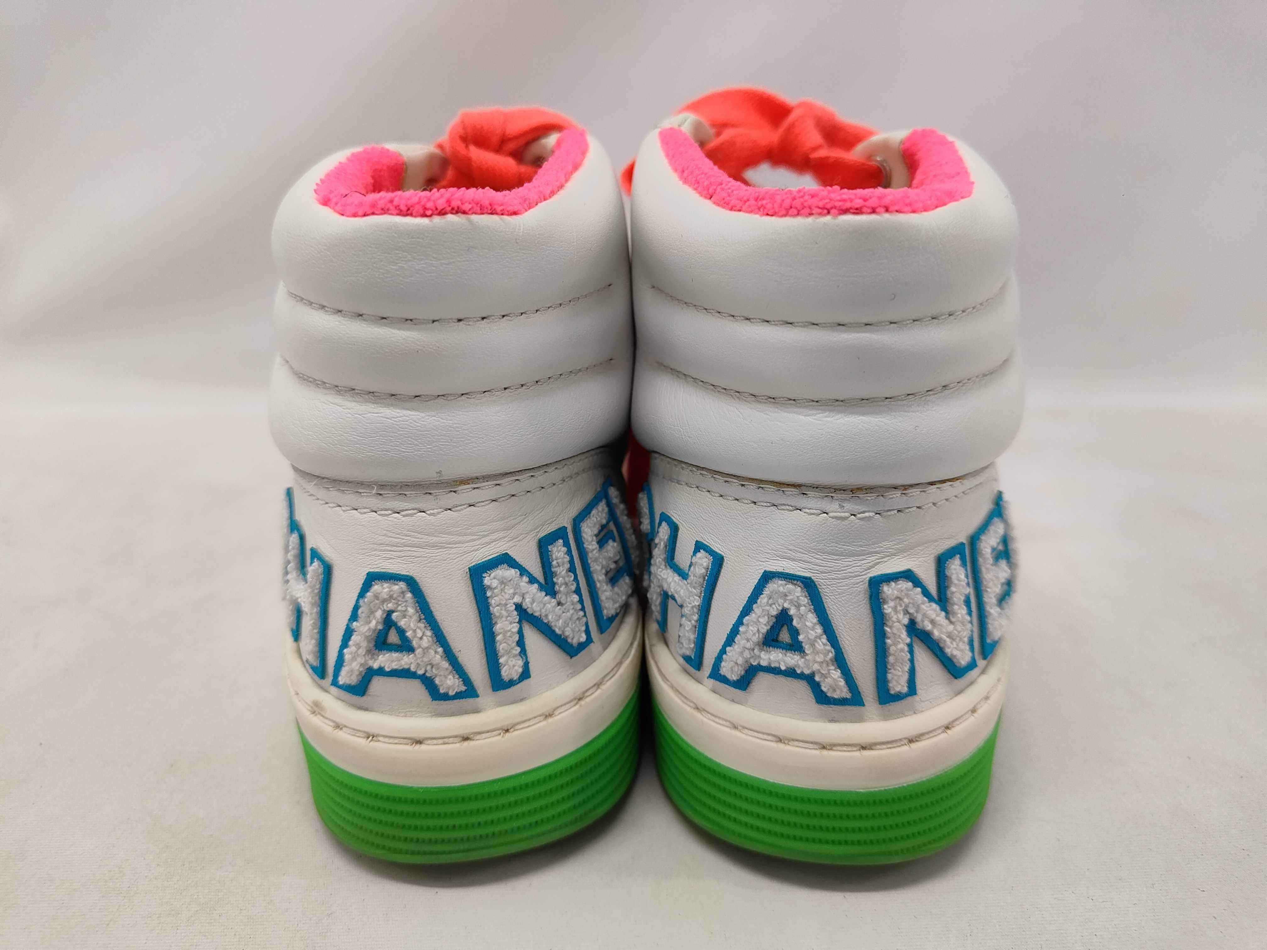 A Pair of Chanel Multicolor Leather High-Top Sneakers