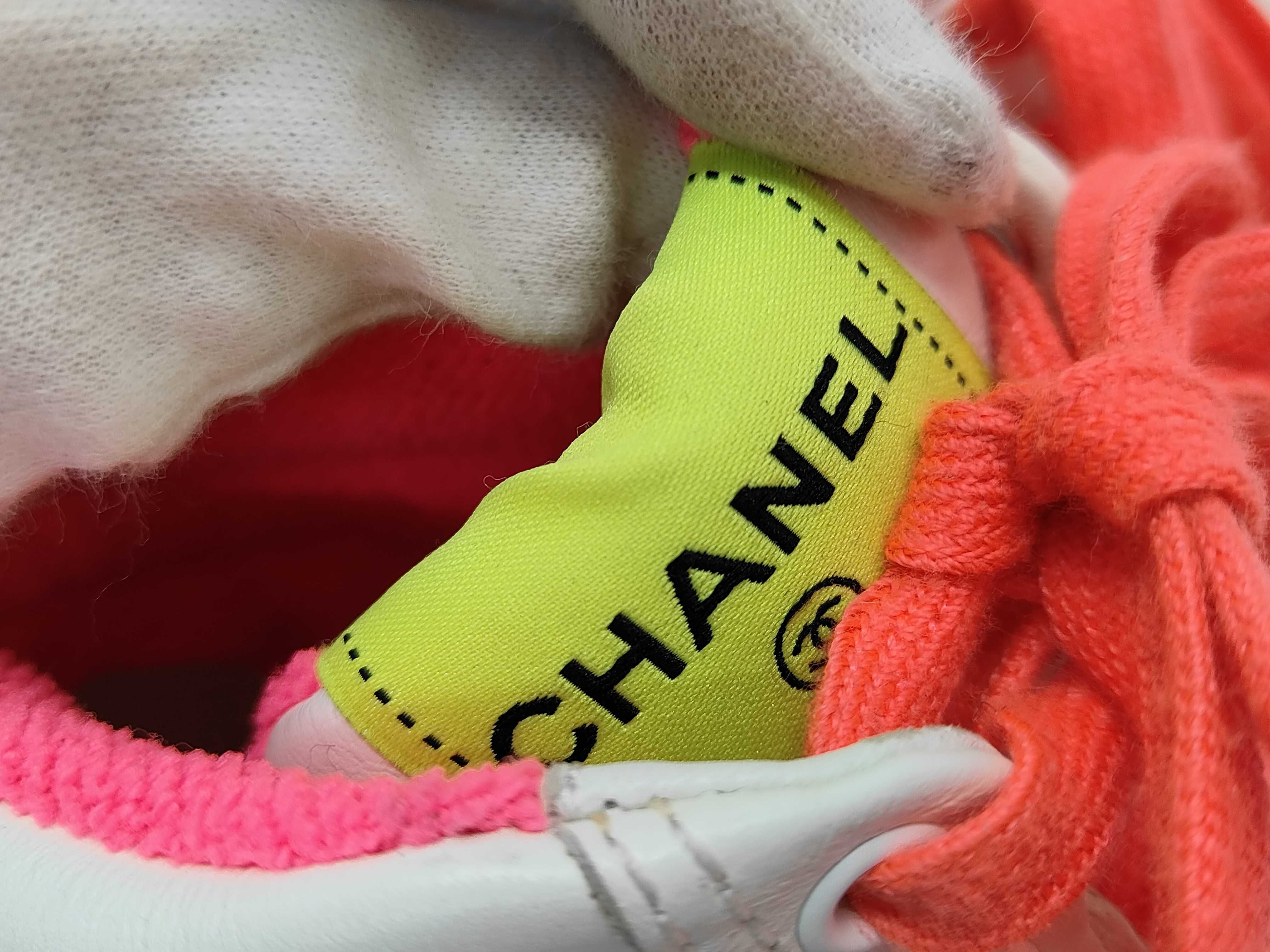 A Pair of Chanel Multicolor Leather High-Top Sneakers