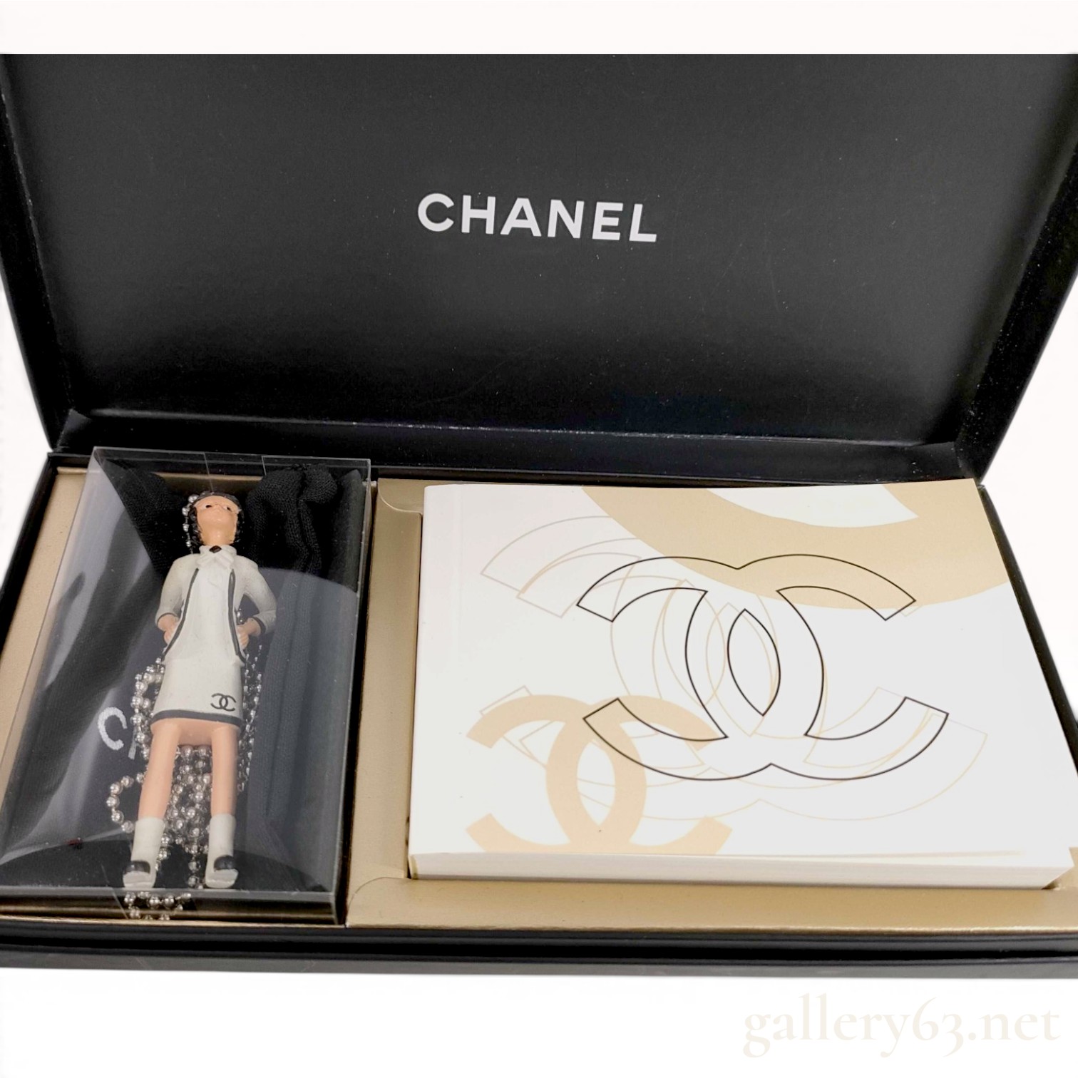 Chanel Coco Doll Figurine Pendant Necklace and Animation Booklet